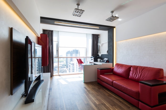 Innenansicht eines Studio-Apartments mit Balkon