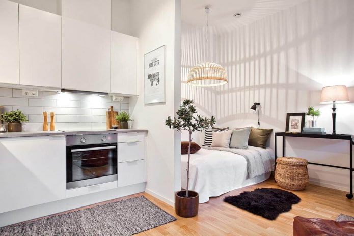 Schlafbereich-Gestaltung im Inneren eines eines Studio-Apartments