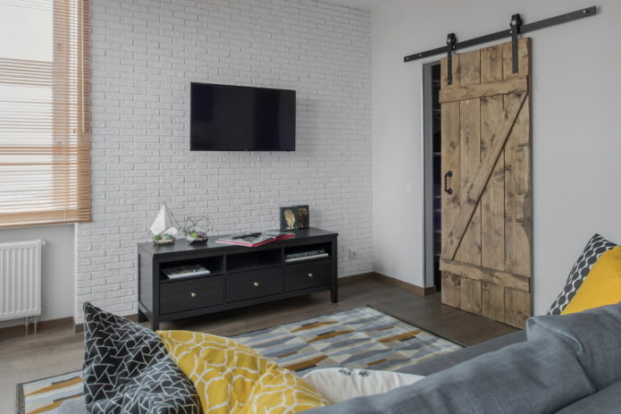 Scheunentore in einem Loft-Stil Interieur