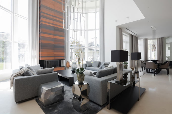 Wohnzimmer mit einer grauen Sofagruppe