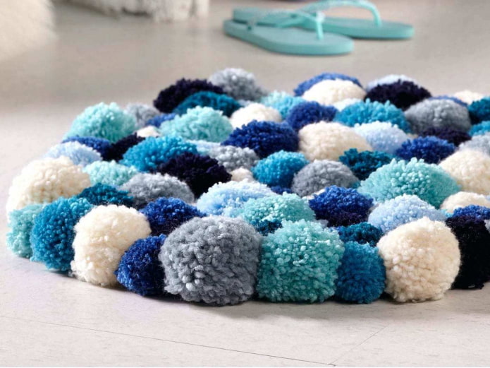 Teppich aus Pompons