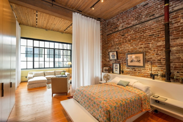 Loft-Stil im Schlafzimmer-Wohnzimmer
