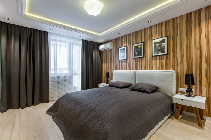 Bett mit weichem Kopfteil im Schlafzimmer