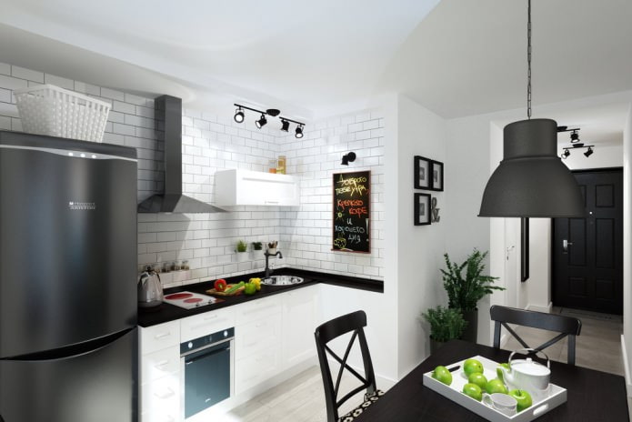 Küche in einem 33 m² großen Studio.