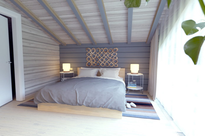 weißes und lila Schlafzimmer in einem Holzhaus