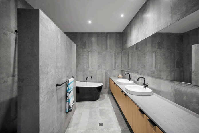 Graues Badezimmerinterieur im minimalistischen Stil