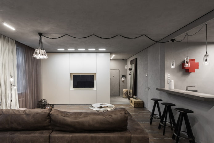 Schrank mit Fernseher als Raumteiler