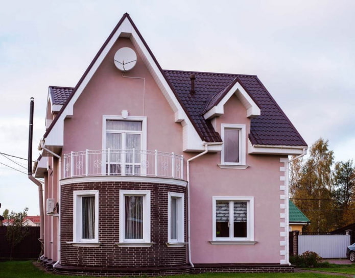 rosa Haus mit Kirschdach