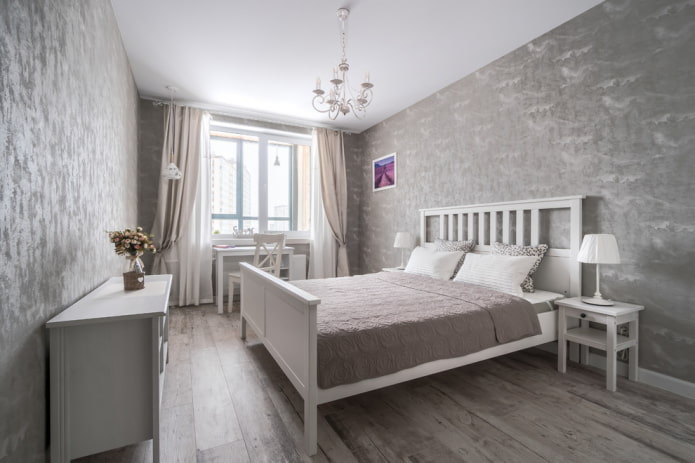 Grau-weißes Schlafzimmer-Interieur