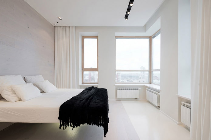 Textilien im Schlafzimmer-Interieur im minimalistischen Stil